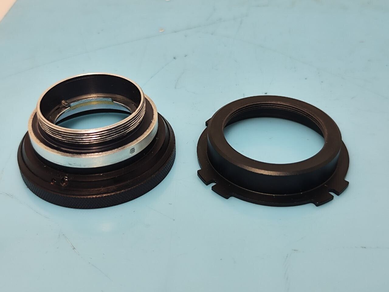 Custom adapter for use on Russian Rubin-1 zoom lens. M42 + Arri PL.