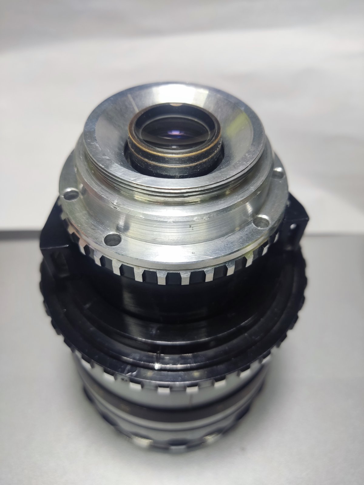 Custom adapter for use on Russian Rubin-1 zoom lens. M42 + Arri PL.