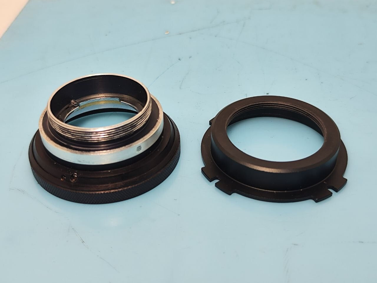 Custom adapter for use on Russian Rubin-1 zoom lens. M42 + Arri PL.